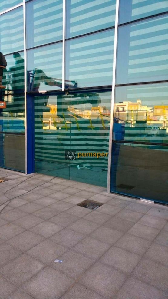 Puerta automática de cristal